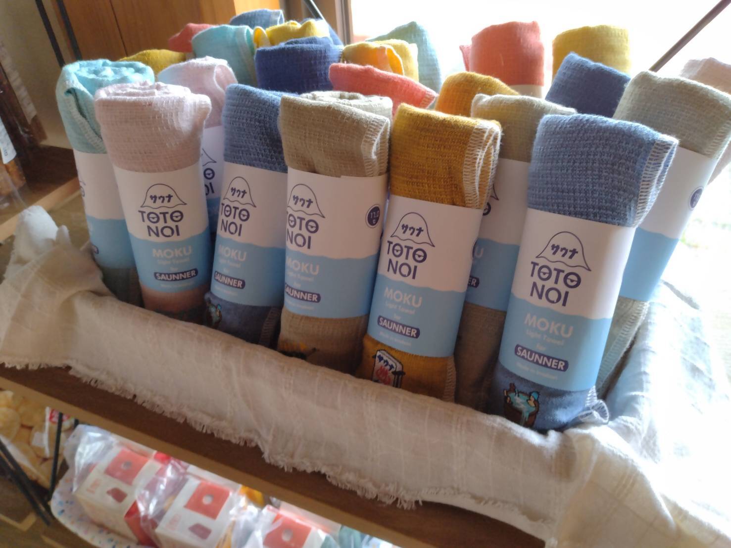 サウナ用品の写真（洗う、巻く、拭く、しぼるの用途に適したタオル）